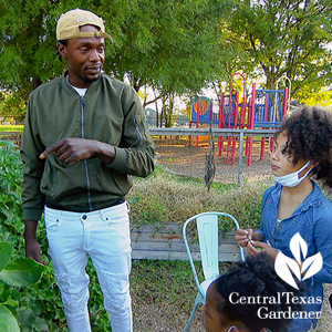 Black Lives Veggies advocate Larry Franklin teaching children in the garden