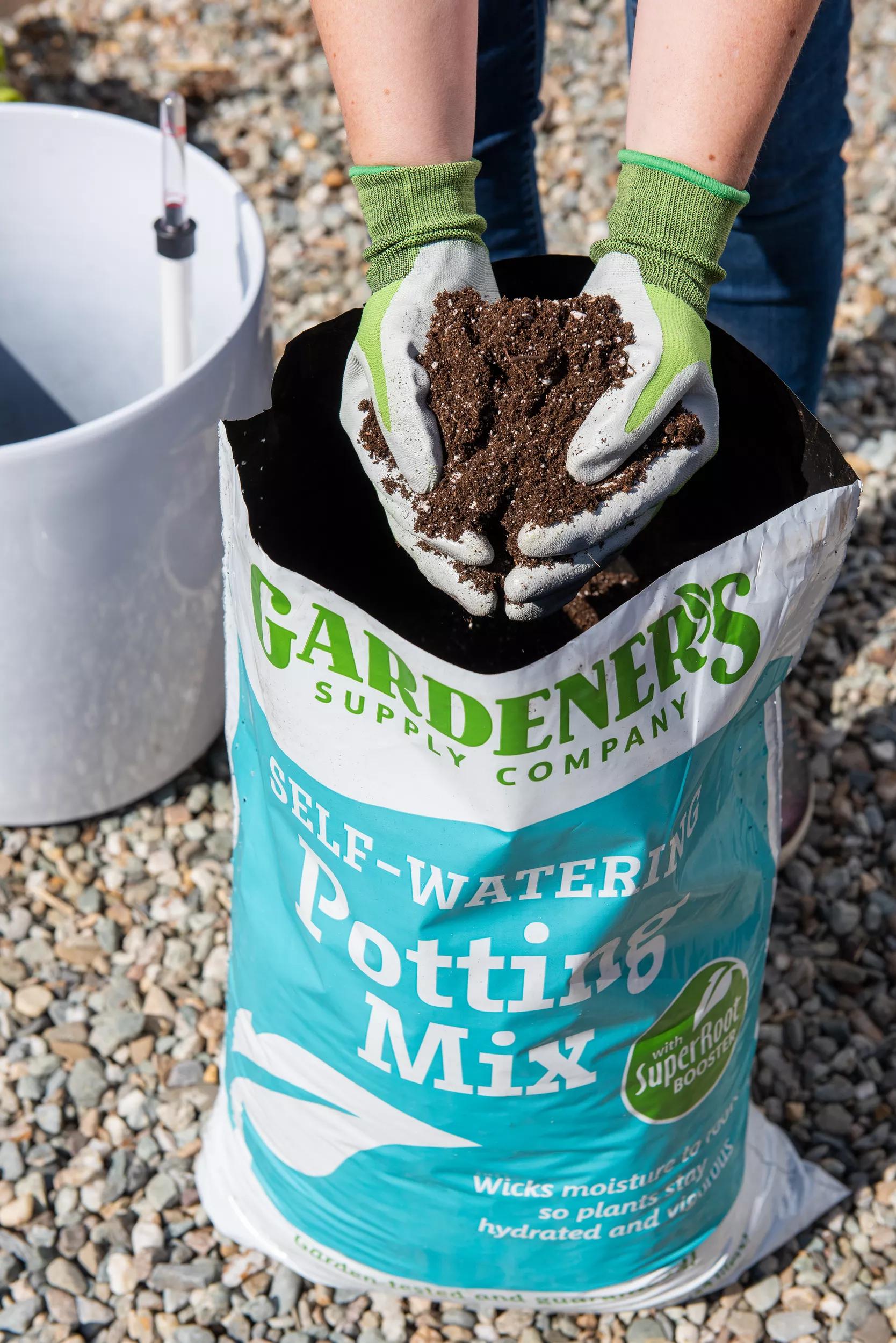 can i use potting mix for outdoor plants Self-Watering Potting Soil Mix with Root Booster