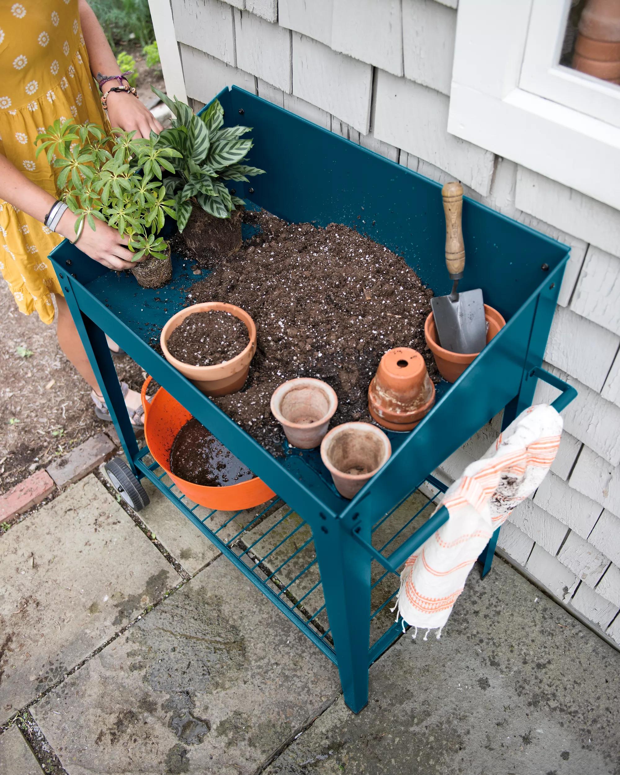 high bench over gas meter potted plants Demeter™ Potting Bench