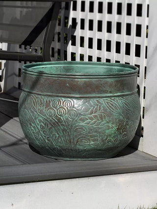  || https://assets.gardeners.com/transform/a556b033-559f-4d65-9d57-f46386c8abe3/8612735_01V_key-west-hose-pot
