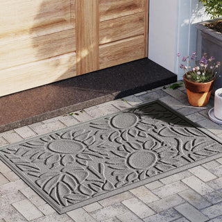  || https://assets.gardeners.com/transform/33acd1e3-2a38-488e-85a9-3e7e75c958db/8614351_05V_sunshine-day-waterhog-doormat-23-x-35