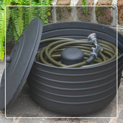 Matte Black Hose Pot with lid with green hose coiled inside